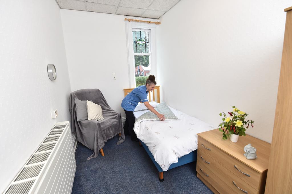 A resident enjoying the modern facilities at Henley House