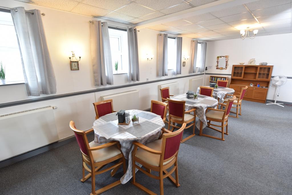 The dining room prepared for a meal